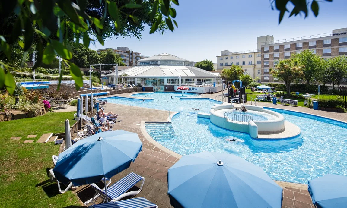 Pool and hotel exterior